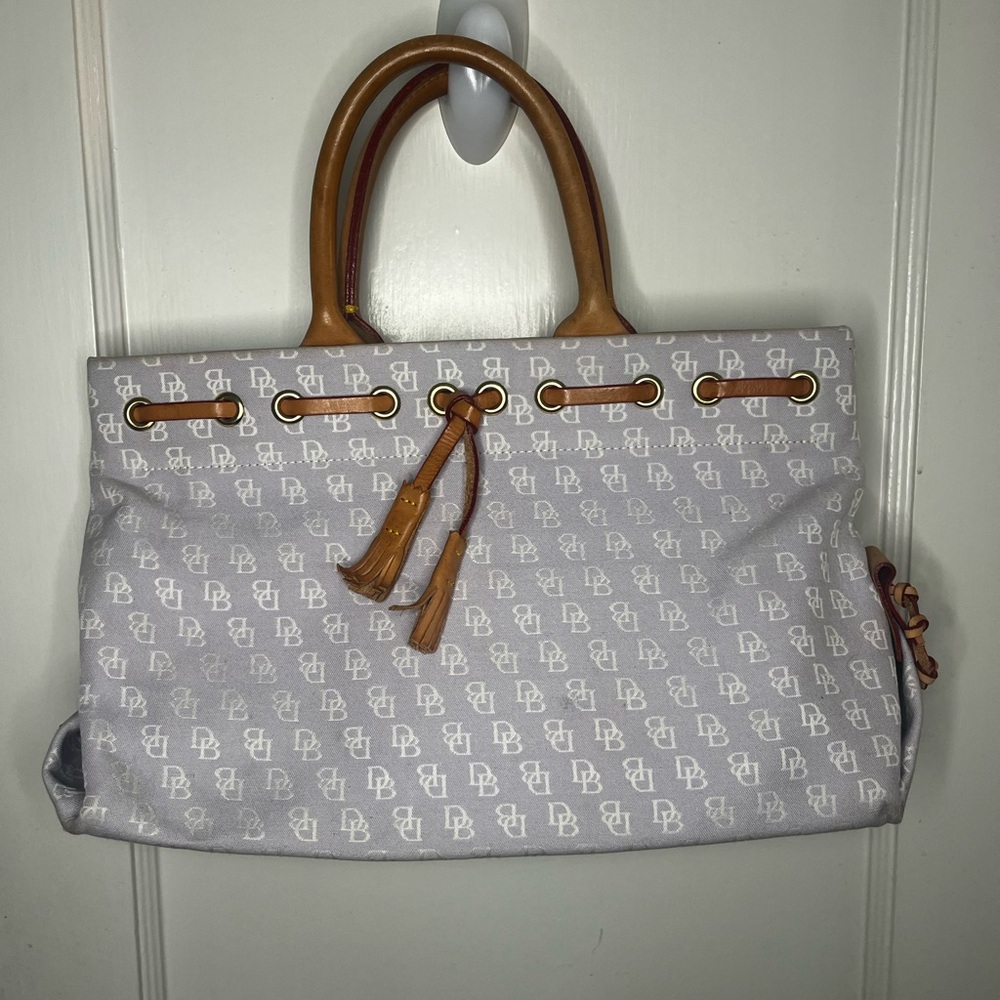 Dooney and Bourke  Beige Canvas and Leather Signature Tassel Tote Handbag
